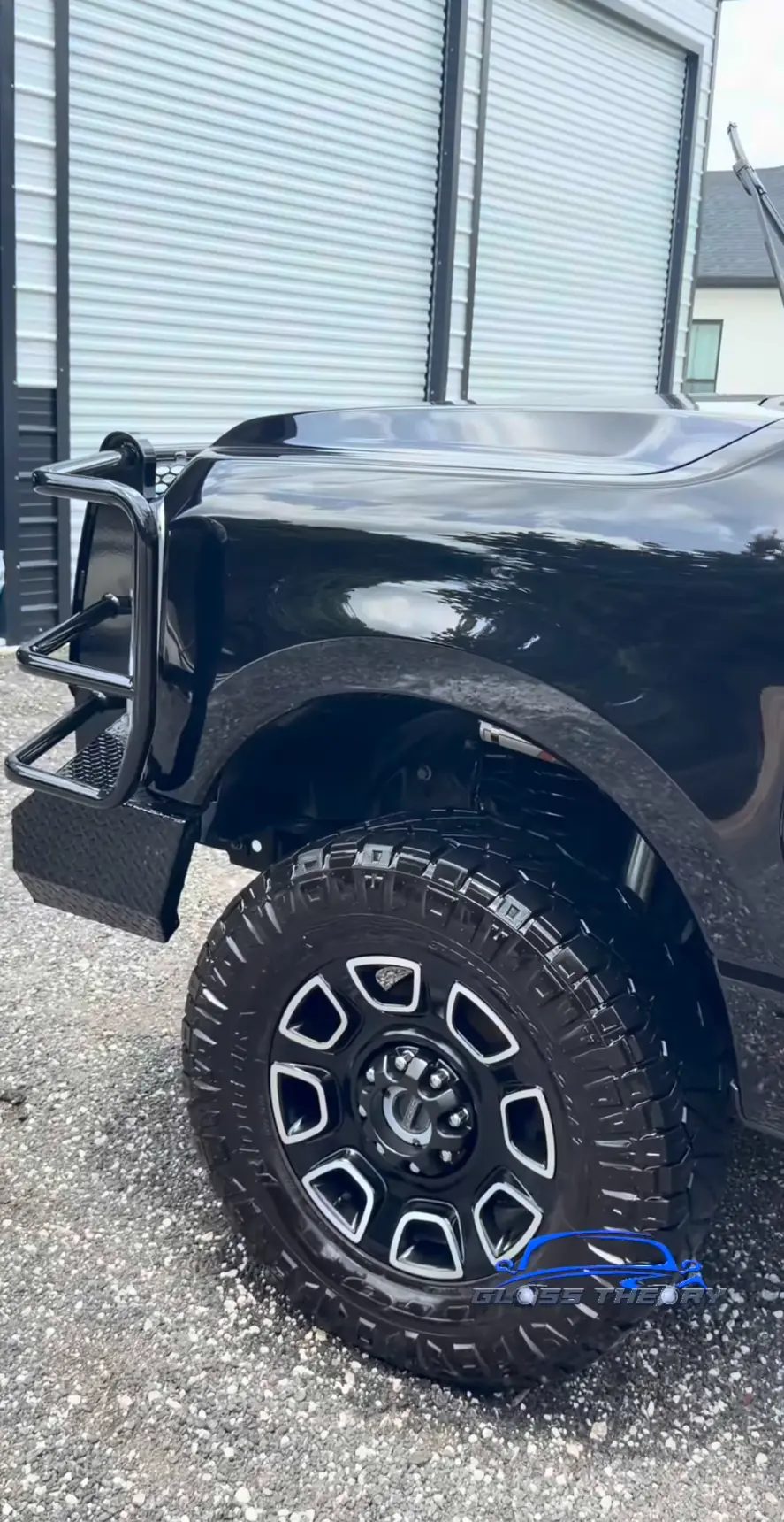 Black truck wheel and tire, cleaned and dressed